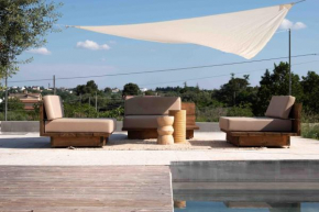 Alloggio nei Trulli della Masseria Collina Casanoja